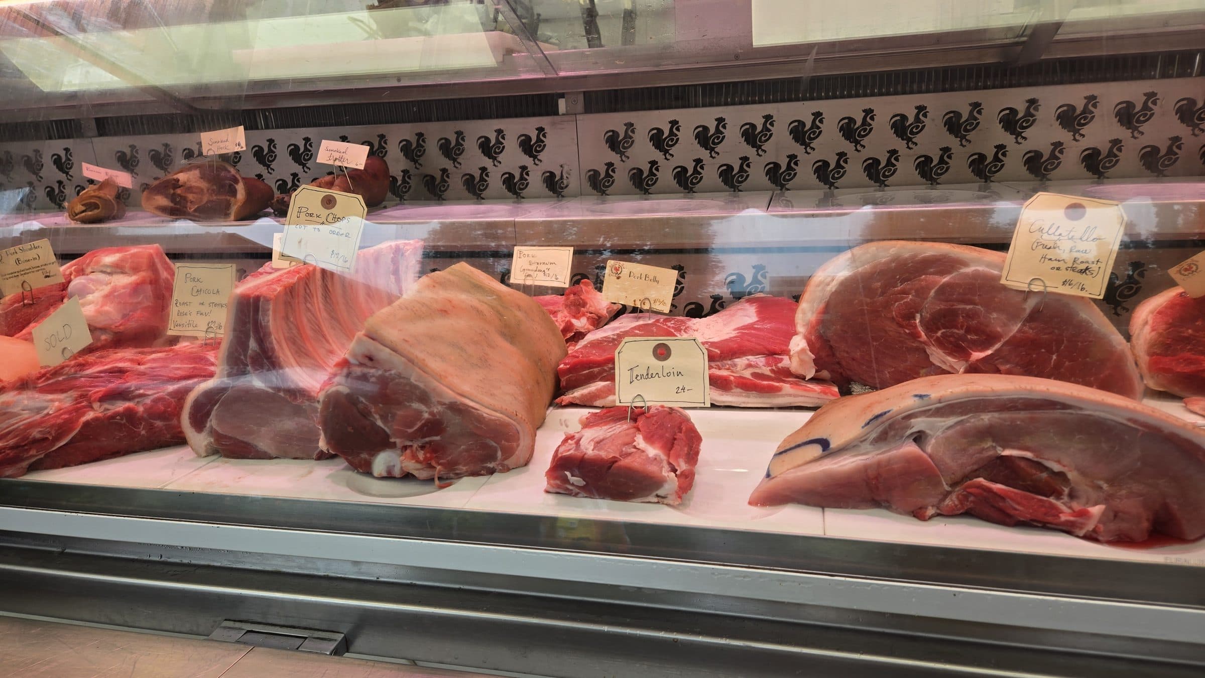 Pork roasts and large cuts in the Sea Breeze Farm market case